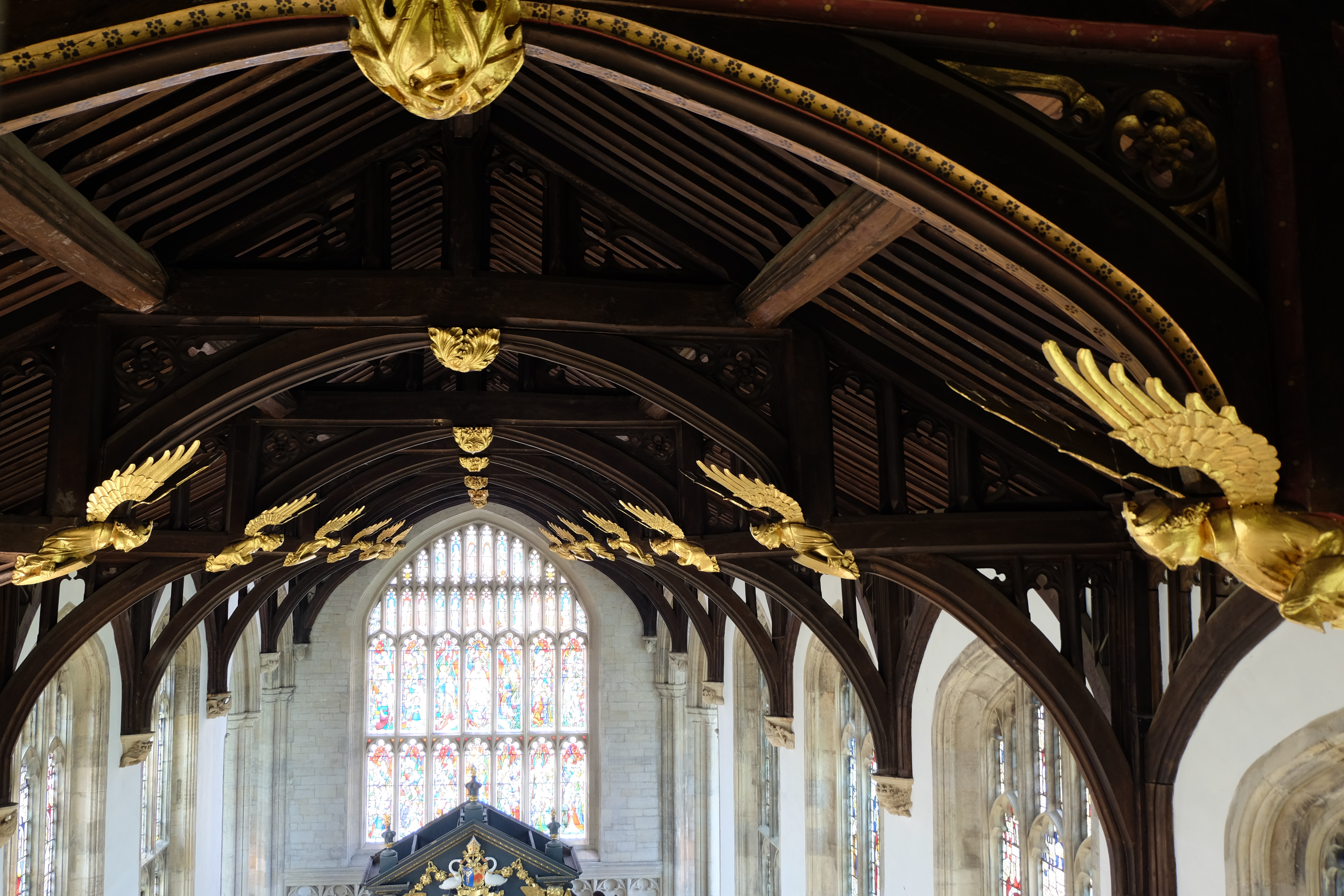 carved gilt angels in the College chapel rafters